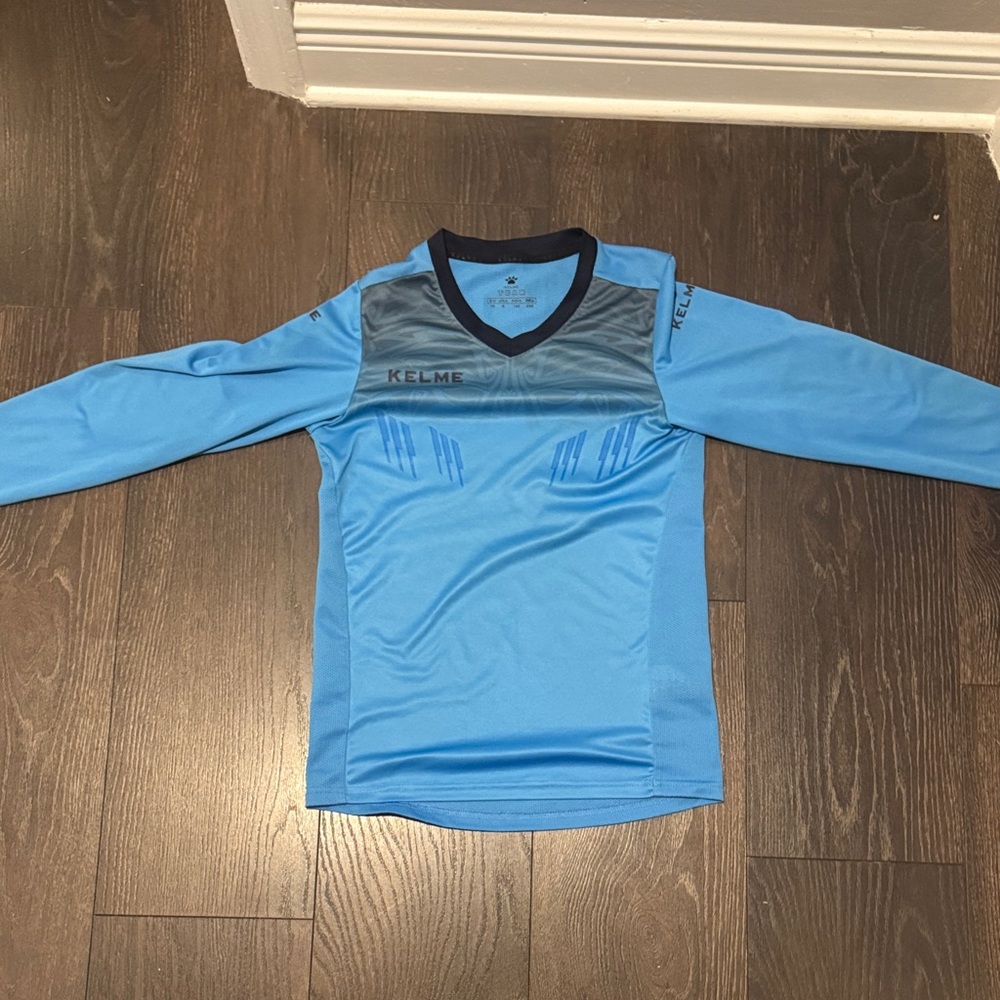 Kelme Kids' Sky Blue Long Sleeve Jersey for big kids